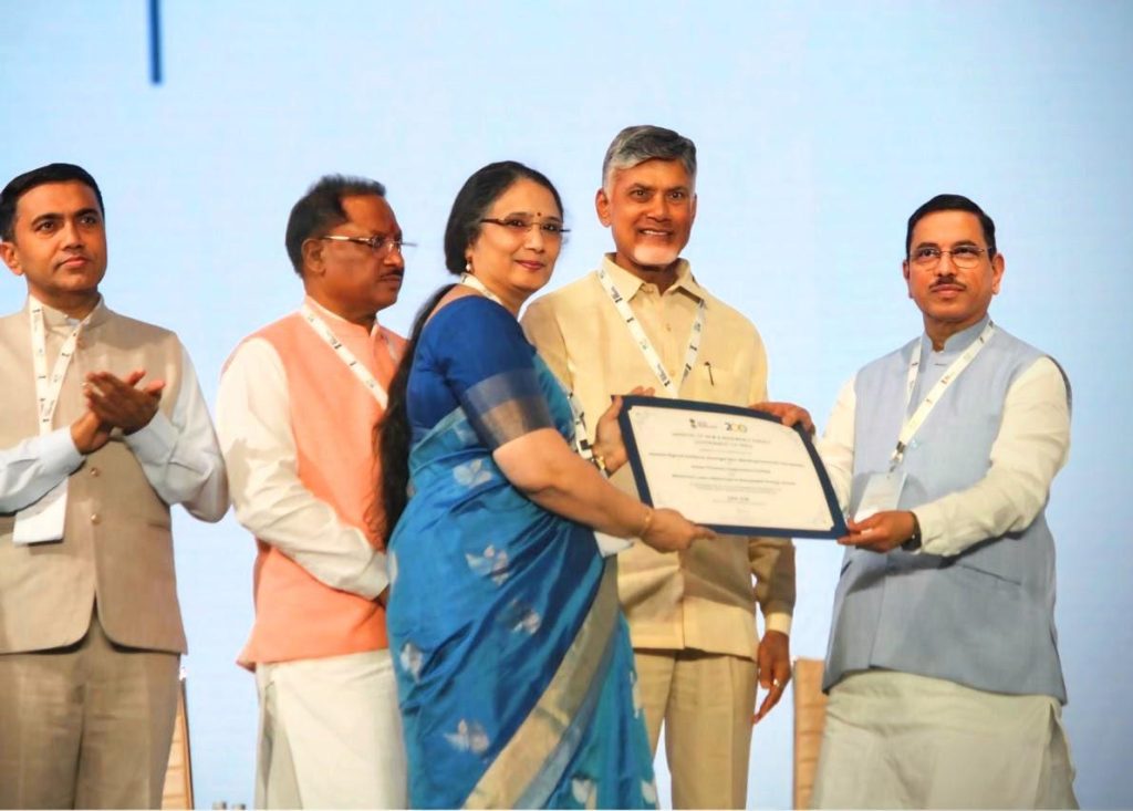 Smt. Parminder Chopra, CMD, PFC, receiving the prestigious Recognition Certificate from Shri Pralhad Joshi, Hon’ble Union Minister of New and Renewable Energy (MNRE) at RE-INVEST 2024 in the presence of Hon'ble Chief Ministers of Andhra Pradesh, Chhattisgarh & Goa. The certificate was given in recognition of PFC’s outstanding contribution to India achieving the 200GW Non-fossil Power Capacity milestone.